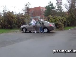 Reckless girls managed to find a süýji spot to piss between parked cars