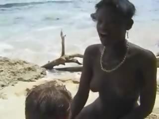 Hairy African darling fuck Euro lassie in the Beach
